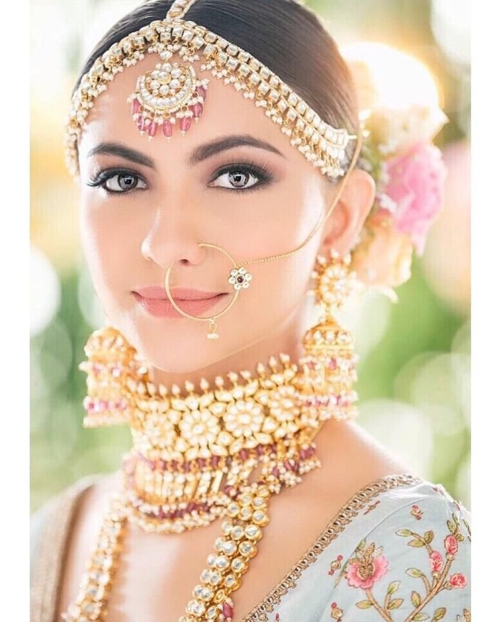 Beautiful bride with elegant bridal makeup and hairstyle Bengaluru