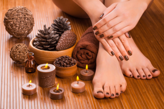 "A professional beautician at Shrees Beauty Parlour in Kathreguppe, Banashankari 3rd Stage, Bengaluru, providing a relaxing pedicure and manicure service to a client."