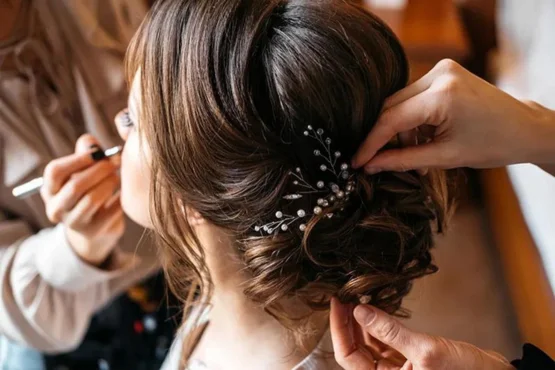 "A professional hair stylist at Shrees Beauty Parlour in Kathreguppe, Banashankari 3rd Stage, Bengaluru, skillfully styling a client's hair."